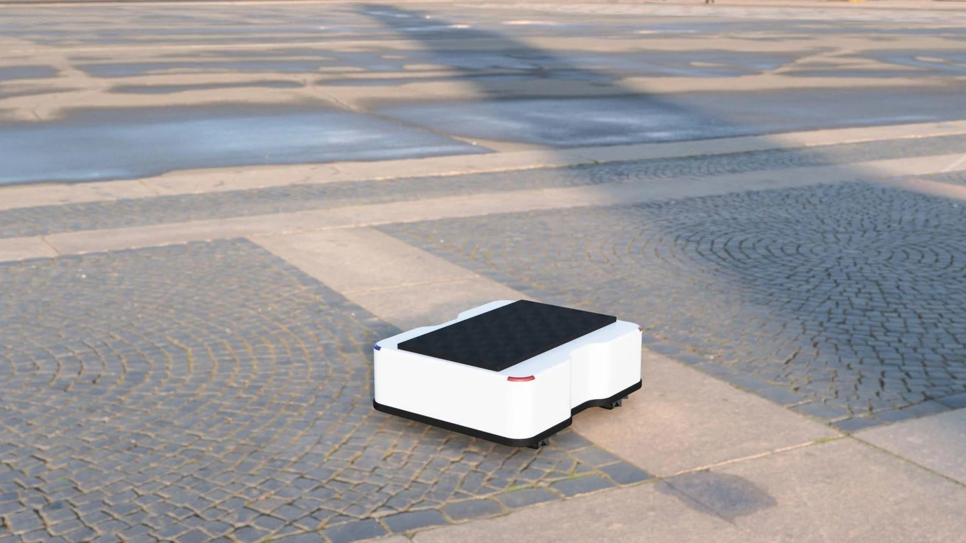 白い筐体と黒い荷台を備えたAGV・移動ロボットのイメージ